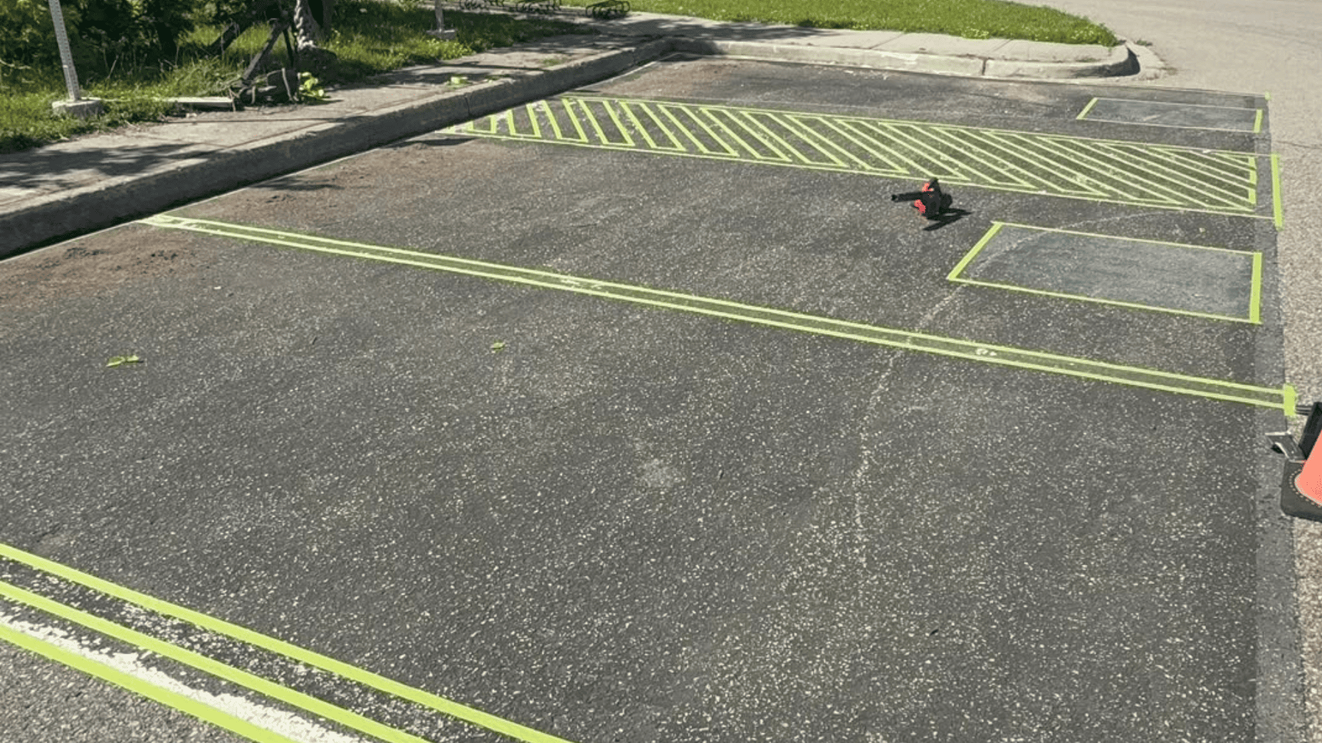 Parking lot lines taped before painting